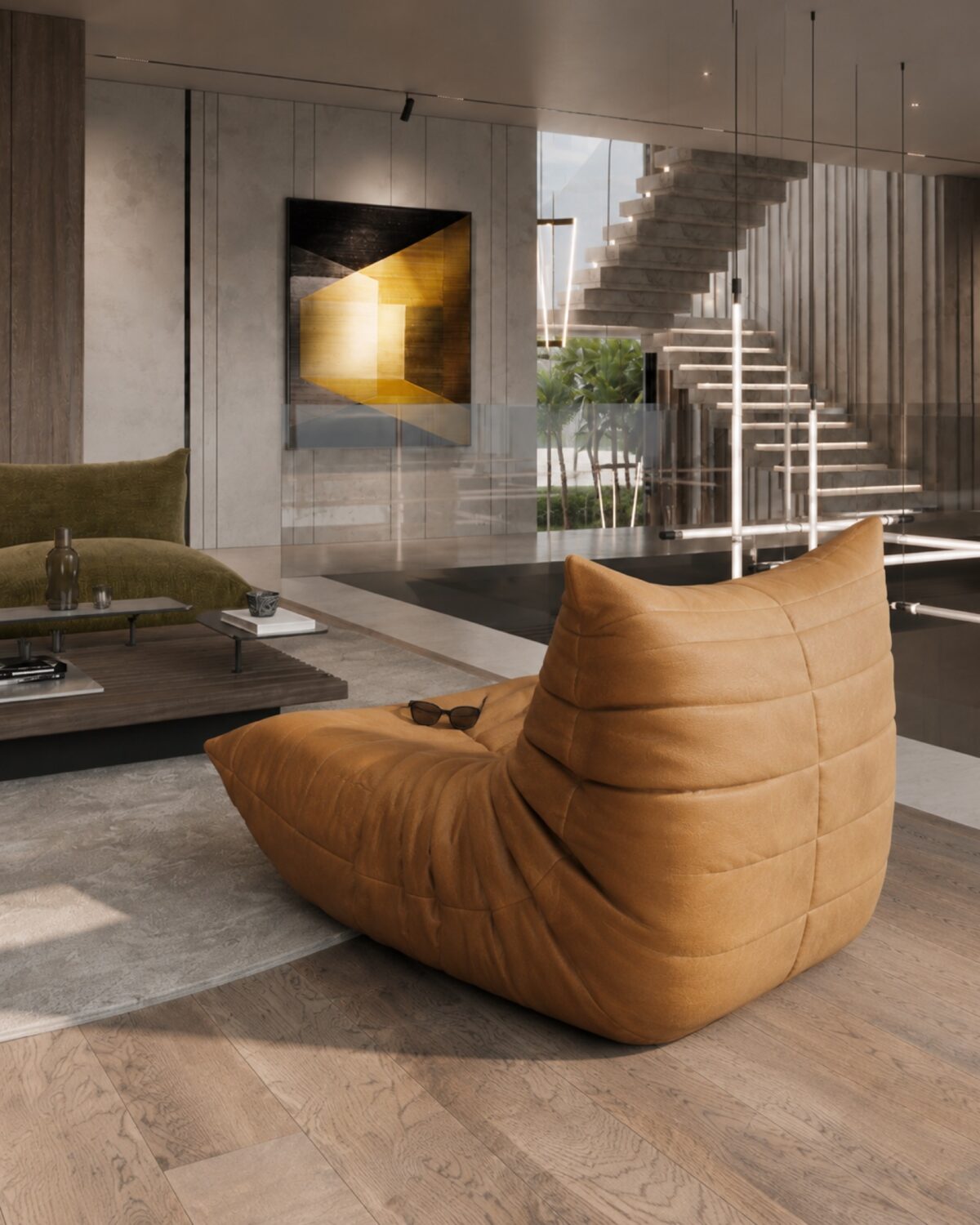 Low caramel and olive seating softening the concrete and glass architecture at CT Villa